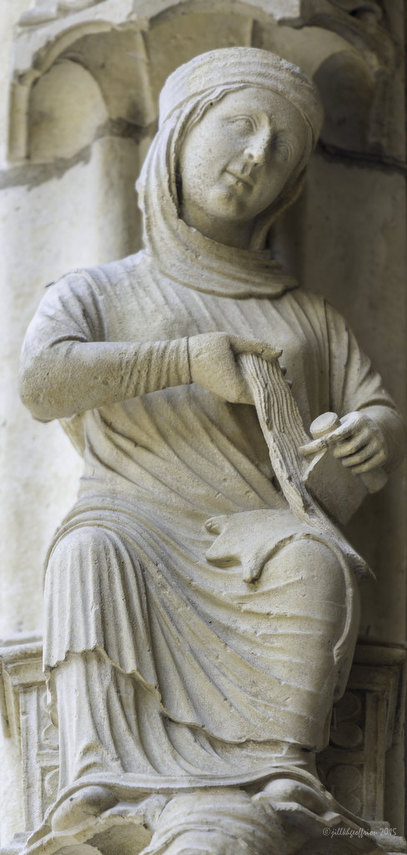 Sculpture of active woman, North Porch