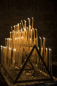 White prayer tapers at the Chartres Cathedral by photographer Jill K H Geoffrion