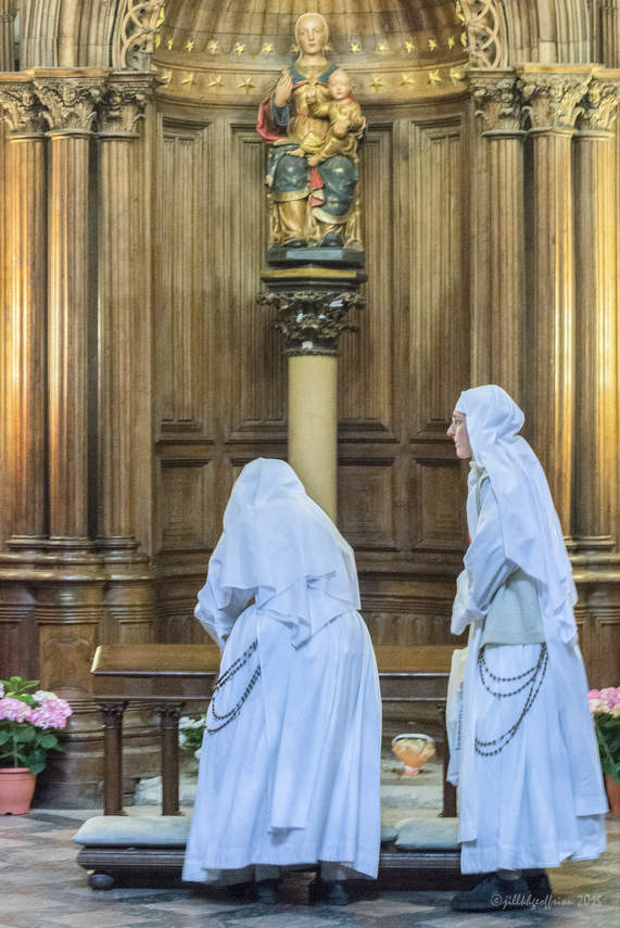 Nuns in the Chapel of Notre Dame du Pilier at Chartres Cathedral by photographer Jill K H Geoffrion