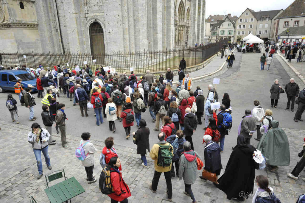 Pilgrim groups arriving at Chartres Cathedral by photographer Jill K H Geoffrion