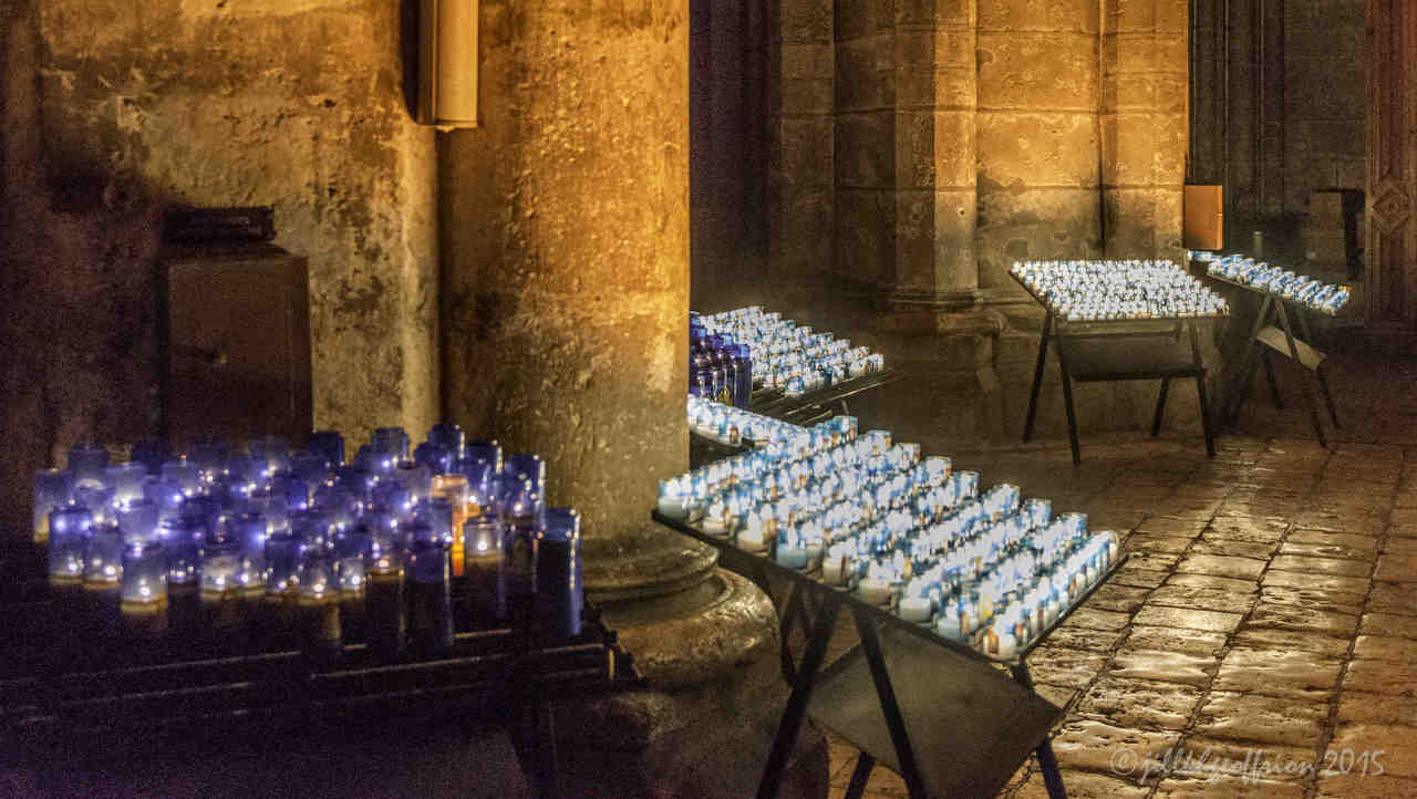 Prayer Candles at Chartres Cathedral by photographer Jill K H Geoffrion