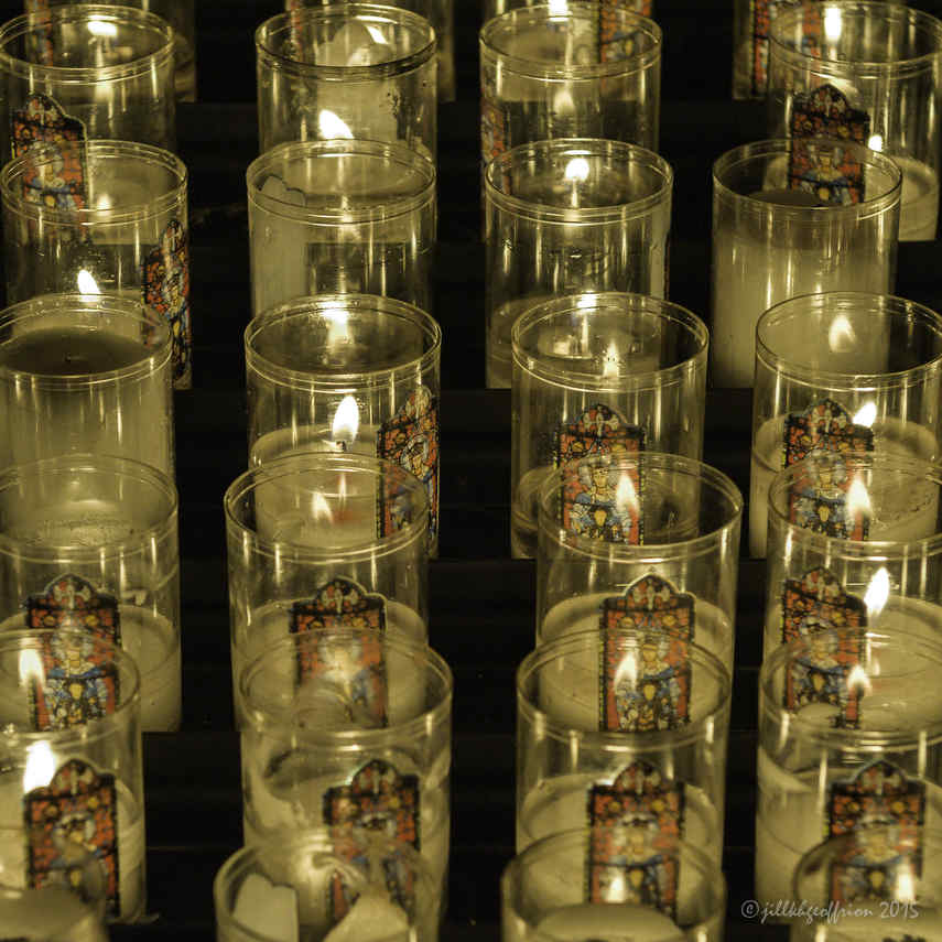 Candles burning (with the image of Notre Dame de la Belle Verrière)