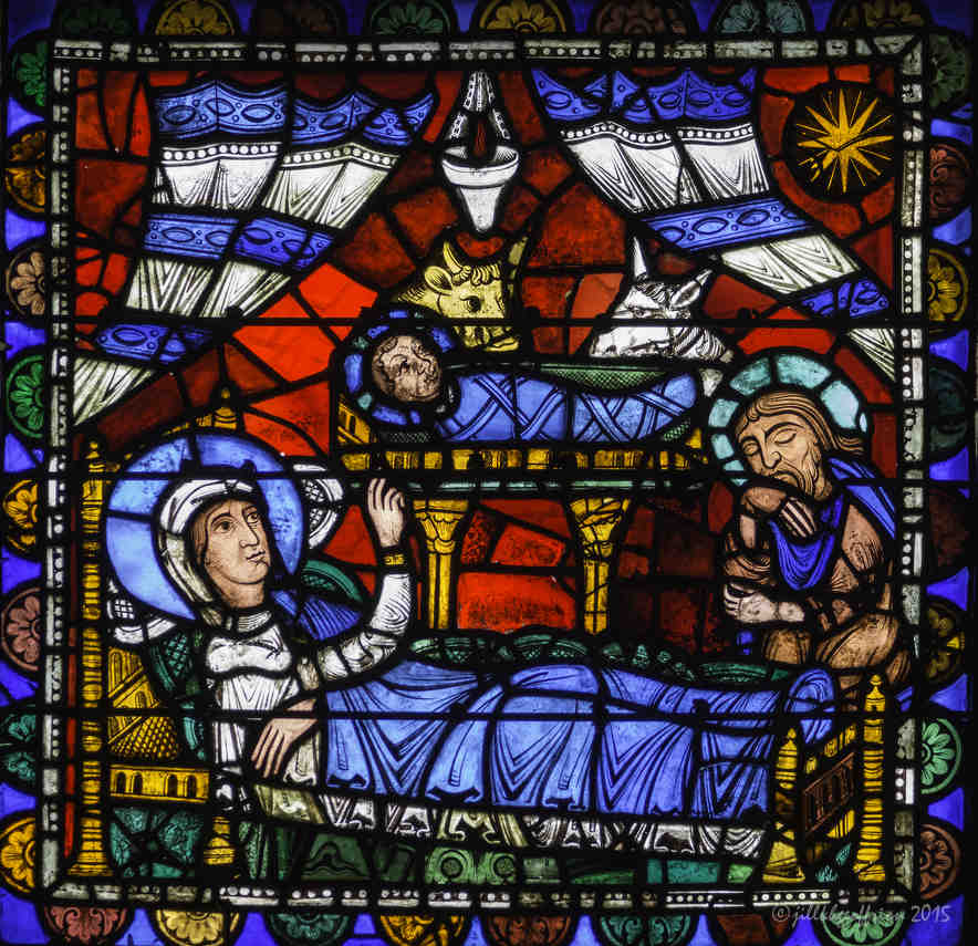 Nativity, 12-century stained glass window at Chartres Cathedral  by Jill K H Geoffrion