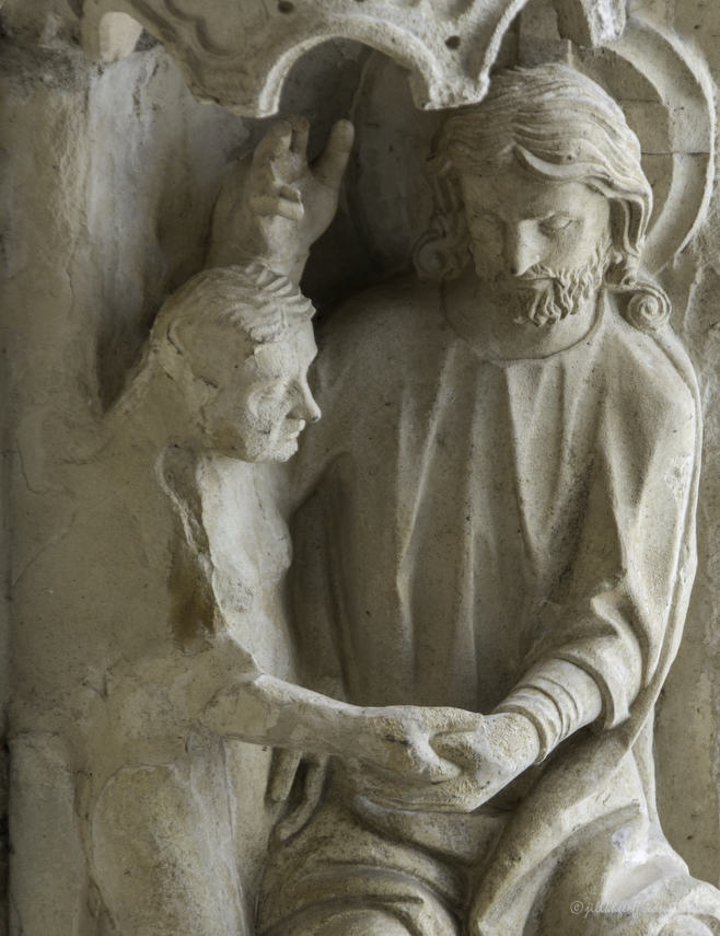 God creating Eve at Chartres Cathedral by photographer Jill K H Geoffrion