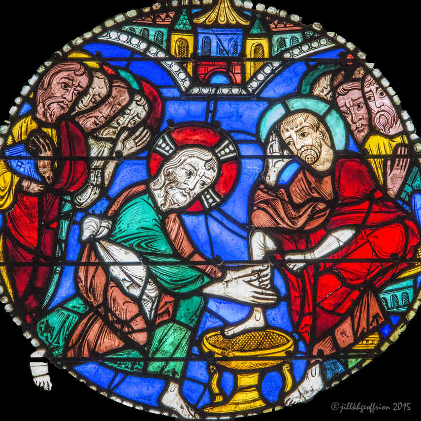 Jesus washing Peter's foot in the Passion and Resurrection Window at Chartres Cathedral by photographer Jill K H Geoffrion